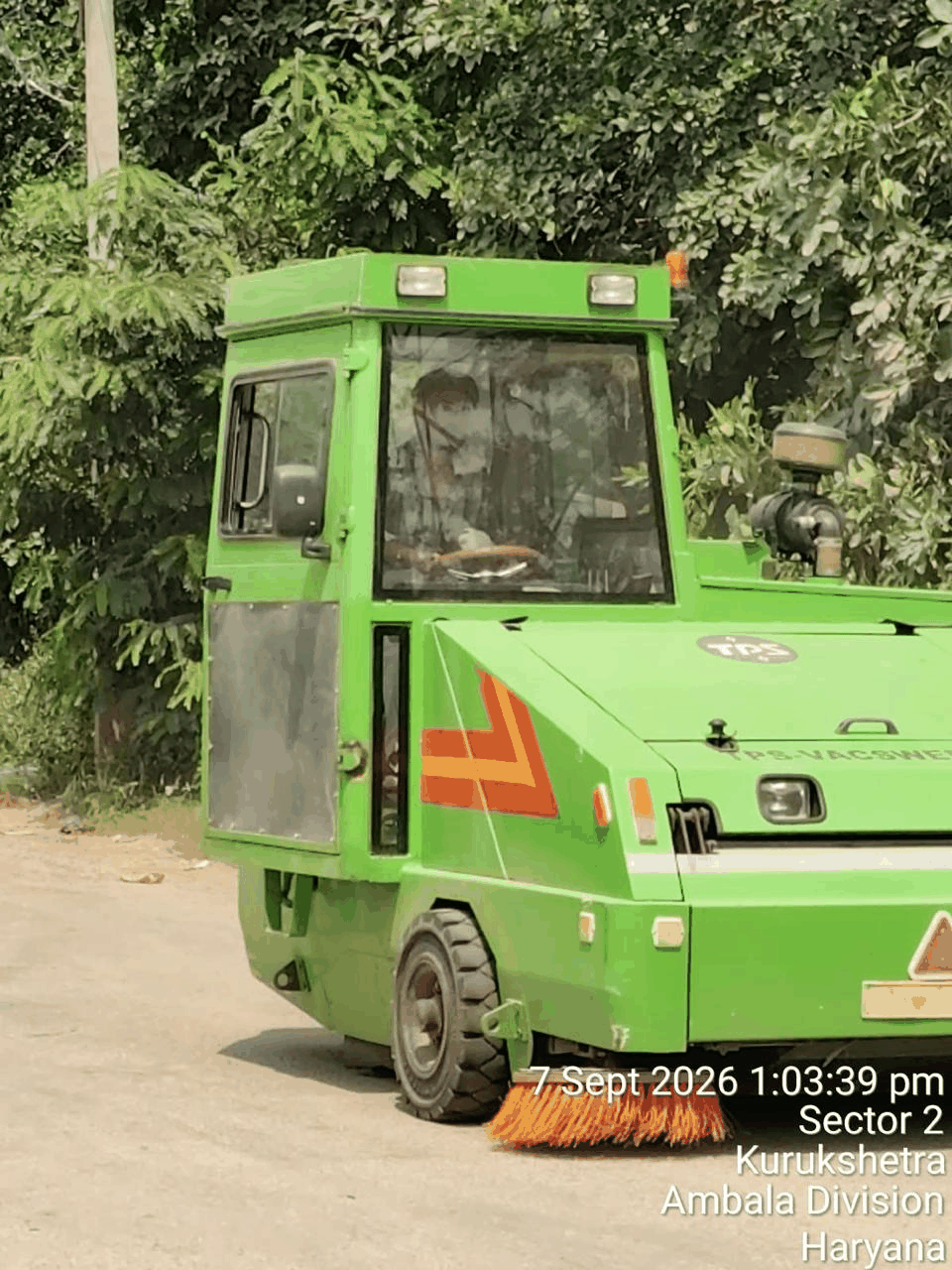 S.S. Solutions operator driving the sweeping machine in Sector 2, Kurukshetra